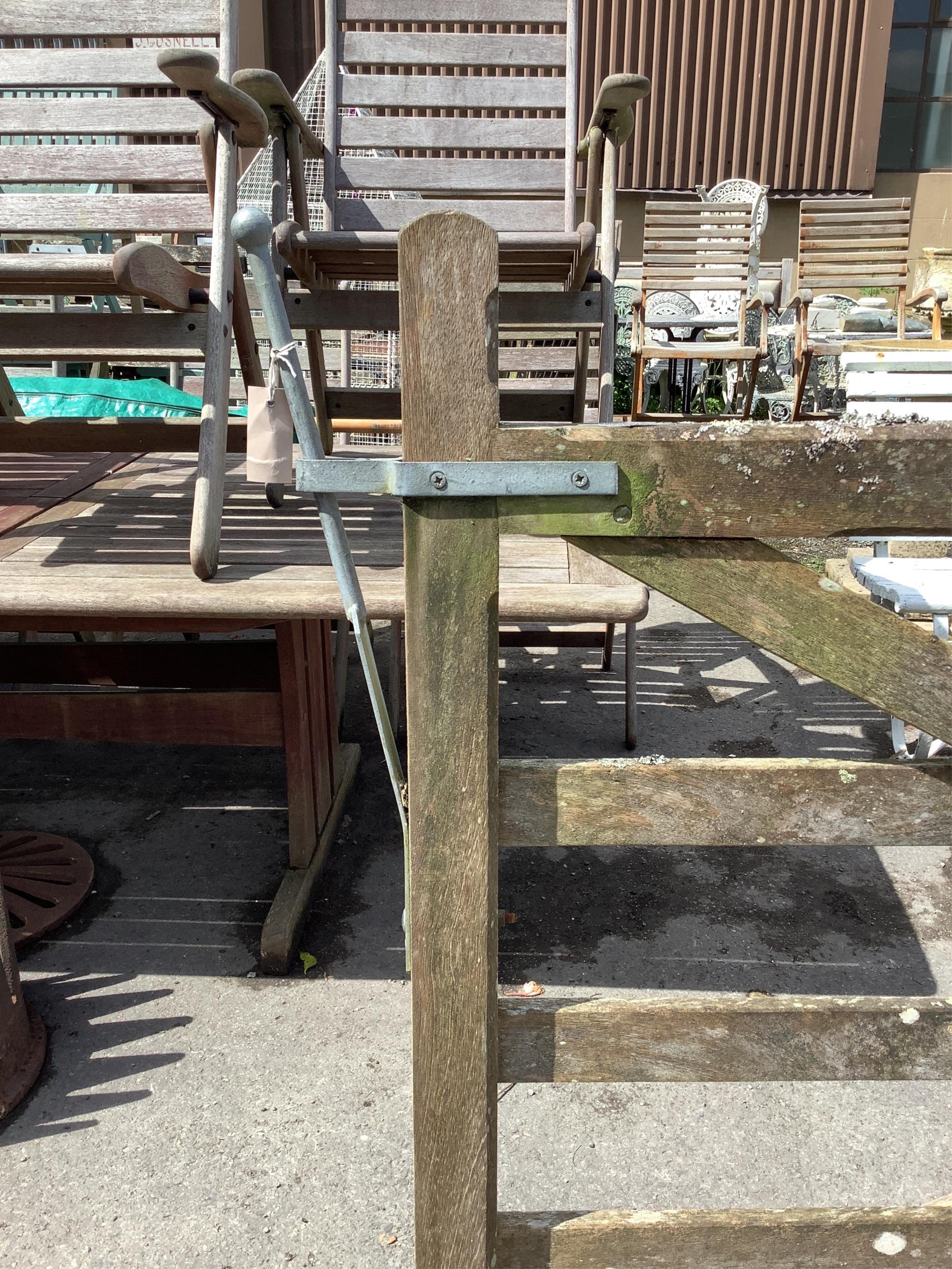 A pair of 12ft Biddenden hardwood gates with galvanised mounts. Condition - poor to fair